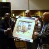 Classs of 2011 Inductee John Mugabi ,Arcadio Castro with his orginal artwork of front cover of program and FBHOF President Butch Flansburg