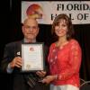 Danielle Plum accepting award for her father Fighter Danny Nardico