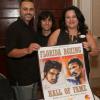 Hall of Fame artist Arcadio Castro, Dalia Duran and son with Arcadio's program cover