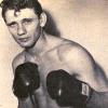 Tony Alongi, was a highly regarded and highly touted heavyweight prospect in the early 1960s. As an amateur Tony had an undefeated record of 27-0 (12 knockouts).  Using a stand-up boxer-puncher style, Tony took the boxing world by storm after turning pro.  