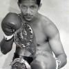 Fighter: Sugar Baby Rojas:  Born January 2 1961 in Barranquilla, Colombia. He won the WBC Super Flyweight title,  IBF Inter-Continental Featherweight title,  USBA Super Bantamweight title,  WBA Inter-Continental Bantamweight title and WBC FECARBOX Flyweight Champion-
ship. record of 37-8-1, 22KO's